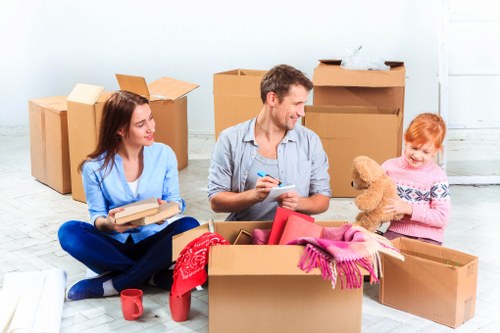 Local moving team carefully handling fragile items