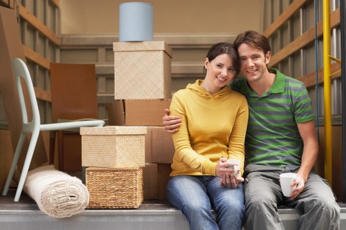 Experienced removalists efficiently packing household items in Kentish Town