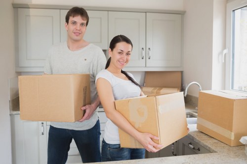 Professional team managing furniture in urban Kentish Town